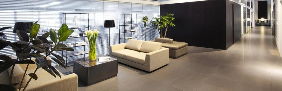 Page heading banner, features clean floor in a lounge type area.